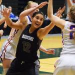 Nikiski&rsquo;s Brianna Vollertsen fights for the rebound against Sitka in Friday&rsquo;s Class 3A state semifinal at the Alaska Airlines Center in Anchorage. (Photo by Joey Klecka/Peninsula Clarion)