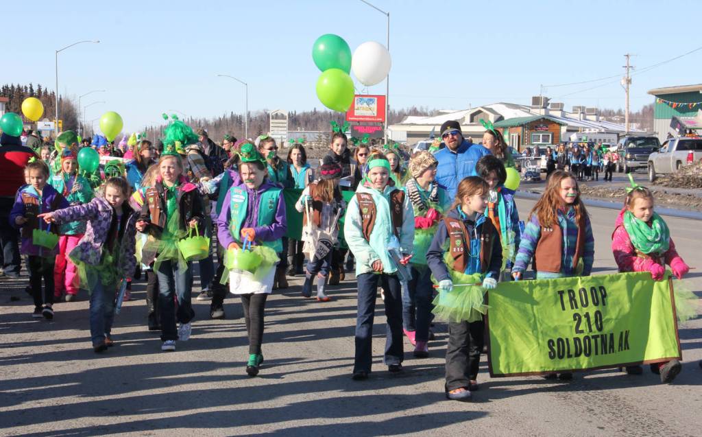 Participants march in Soldotna&rsquo;s St. Patrick&rsquo;s Day parade.