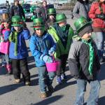 Participants march in Soldotna&rsquo;s St. Patrick&rsquo;s Day parade.