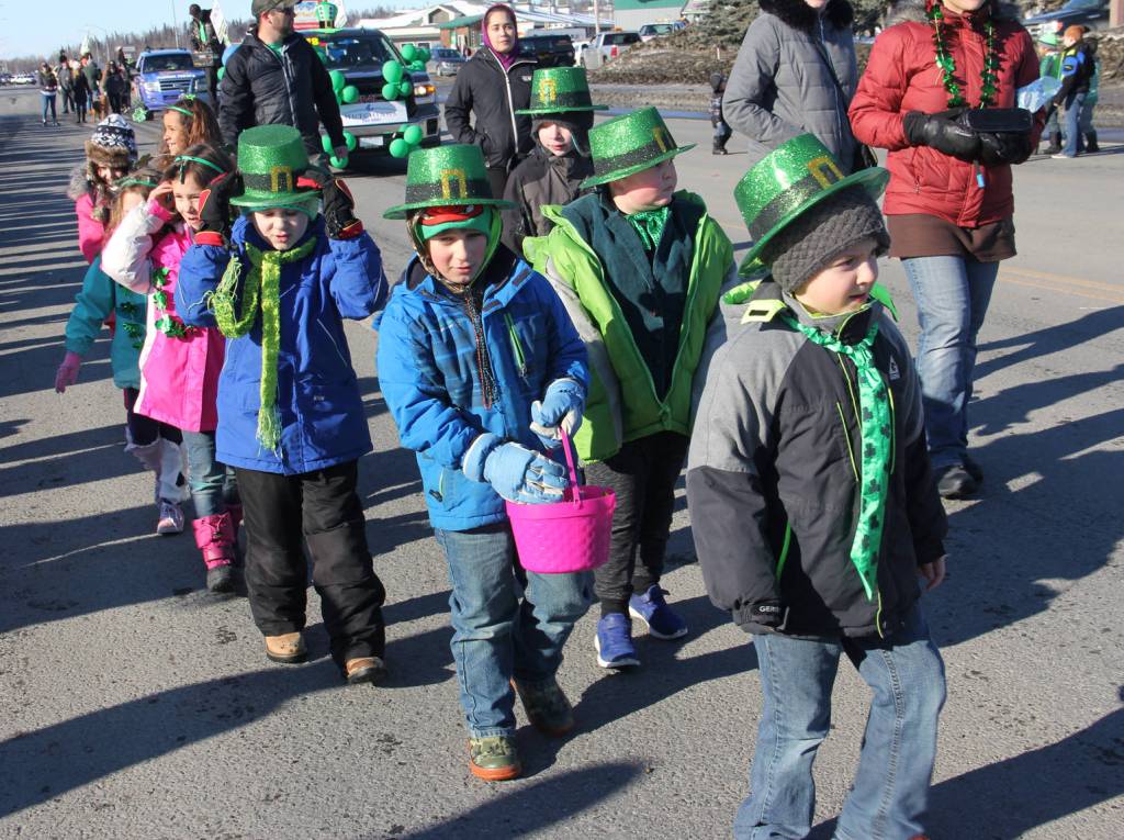 Participants march in Soldotna&rsquo;s St. Patrick&rsquo;s Day parade.