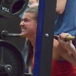 Kenai Central sophomore Olivia Brewer squats Wednesday evening at the 11th biannual CrossFit Competition at Soldotna High School. (Photo by Joey Klecka/Peninsula Clarion)
