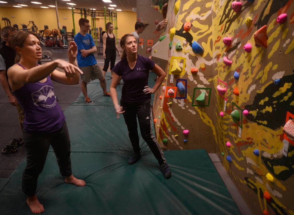 Lori Kohls (left) and Kara Johnston discuss climbing tactics during the opening of River City Wellness Center&rsquo;s new climbing wall on Saturday, April 8, 2017 in Soldotna, Alaska. Lori Kohls (left) and Kara Johnston discuss climbing tactics during the opening of River City Wellness Center&rsquo;s new climbing wall on Saturday, April 8, 2017 in Soldotna, Alaska.