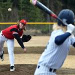 Kenai Central pitcher Gavin Petterson delivers a ball to Soldotna batter Kenny Griffin at the Soldotna baseball fields in April 2016. (Photo by Joey Klecka/Peninsula Clarion)