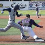 Soldotna sophomore Caleb Spence (4) isn&rsquo;t able to reach first base before the throw against Lathrop at the state baseball tournament in June 2016 at Mulcahy Field in Anchorage. (Photo by Joey Klecka/Peninsula Clarion)