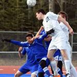 Soldotna&rsquo;s Sam McElroy (22) gets his head on a corner kick against Kodiak Friday at Justin Maile Field in Soldotna (Photo by Joey Klecka/Peninsula Clarion)