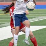 Soldotna&rsquo;s Meijan Leaf controls the ball in front of West Valley&rsquo;s Samantha Stark on Wednesday, April 28, 2017, at Soldotna High School. (Photo by Jeff Helminiak/Peninsula Clarion)