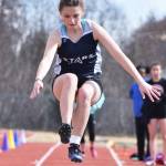 Soldotna freshman Olivia Schwenk completes a long jump attempt Saturday at the Homer Invite at Homer High School. (Photo by Joey Klecka/Peninsula Clarion)