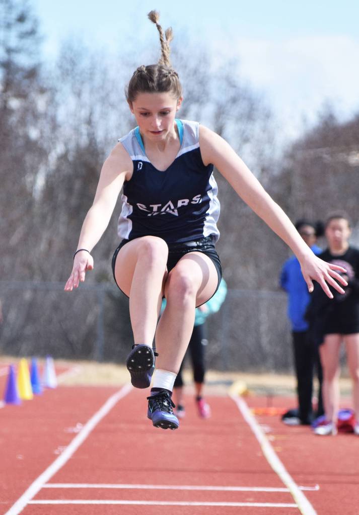 Soldotna freshman Olivia Schwenk completes a long jump attempt Saturday at the Homer Invite at Homer High School. (Photo by Joey Klecka/Peninsula Clarion)
