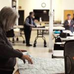Quilters work on quilts for charity at the Funny River Community Center on Thursday, April 27, 2017 in Funny River, Alaska. (Elizabeth Earl/Peninsula Clarion)