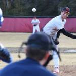 Kenai Central starting pitcher Zack Selinger offers up a pitch to a Kodiak batter Thursday night at the Kenai Little League fields. (Photo by Joey Klecka/Peninsula Clarion)