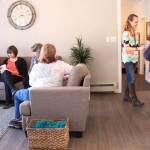 Visitors mingle during an&nbsp;open house for Freedom House, a faith-based sober living home, held Friday, May 5, 2017 in Soldotna, Alaska. The home will accept up to eight women at a time into a nine-month program to help in their recovery. (Megan Pacer/Peninsula Clarion)
