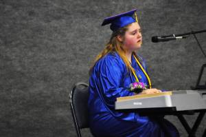 Brooke Kent, a Cook Inlet Academy graduate, plays and sings the song &ldquo;Soar&rdquo; by Meredith Andrews at the school&rsquo;s graduation ceremony Sunday, May 7, 2017 in Soldotna, Alaska. (Elizabeth Earl/Peninsula Clarion)  Brooke Kent, a Cook Inlet Academy graduate, plays and sings the song &ldquo;Soar&rdquo; by Meredith Andrews at the school&rsquo;s graduation ceremony Sunday in Soldotna. (Elizabeth Earl/Peninsula Clarion)