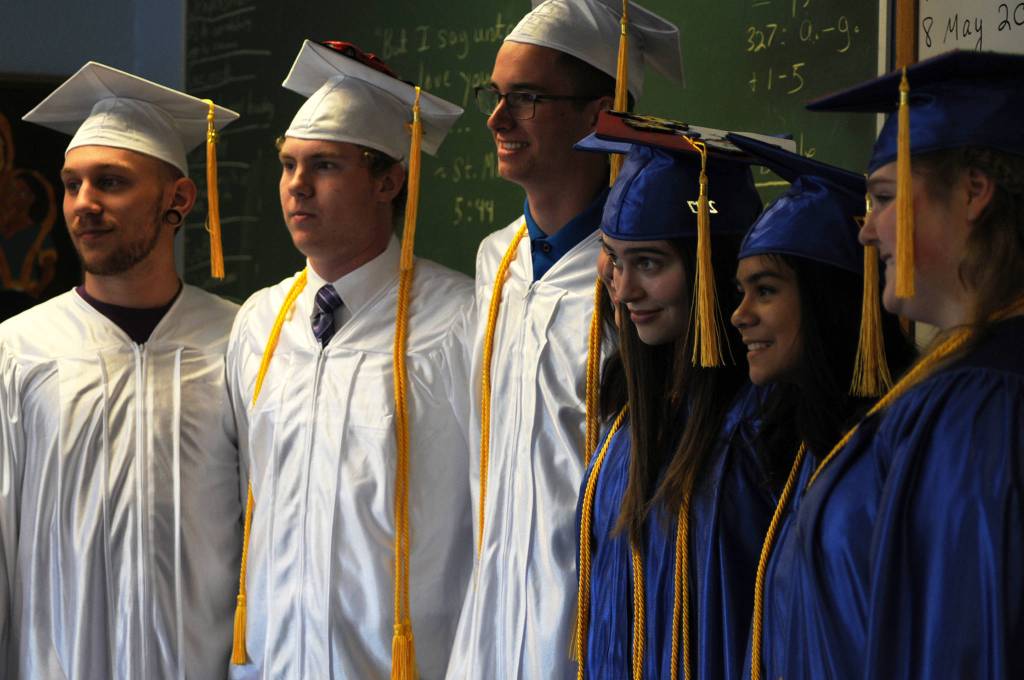 Cook Inlet Academy&rsquo;s graduating class of 2017, with seven seniors, lines up for a final photo before heading into the graduation ceremony held at the school Sunday, May 7, 2017 in Soldotna, Alaska. (Elizabeth Earl/Peninsula Clarion)  Cook Inlet Academy&rsquo;s graduating class of 2017, with seven seniors, lines up for a final photo before heading into the graduation ceremony held at the school Sunday in Soldotna. (Elizabeth Earl/Peninsula Clarion)