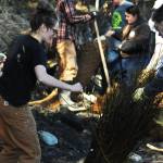 Participants in a streambank rehabilitation workshop at the Donald E. Giman River Center unwrap bundles of felt willow to install as reinforcement along a damaged section of the Kenai River&rsquo;s bank Wednesday, May 10, 2017 in Soldotna, Alaska. The free two-day annual workshop, hosted by the Alaska Department of Fish and Game, teaches people how to properly repair damaged fish habitat along streams in Alaska. (Elizabeth Earl/Peninsula Clarion)  Participants in a streambank rehabilitation workshop at the Donald E. Giman River Center unwrap bundles of felt willow to install as reinforcement along a damaged section of the Kenai River&rsquo;s bank Wednesday in Soldotna. The free two-day annual workshop, hosted by the Alaska Department of Fish and Game, teaches people how to properly repair damaged fish habitat along streams in Alaska. (Elizabeth Earl/Peninsula Clarion)