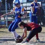 Kenai Central pitcher Cierra King (right) attempts to tag out Kodiak baserunner Cameron Bolen on Thursday, May 11, 2017, evening at Steve Shearer Memorial Ball Park in Kenai. (Photo by Joey Klecka/Peninsula Clarion)