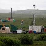 FILE - In this July 13, 2007 file photo, workers with the Pebble Mine project test drill in the Bristol Bay region of Alaska near the village of Iliamma. The Trump administration settled a lawsuit Friday, May 12, 2017, over the proposed development of a massive gold and copper mine at the headwaters of one of Alaska&rsquo;s premier salmon fisheries. The Environmental Protection Agency settled the long-running case with the Pebble Limited Partnership, agreeing to allow the Canadian-owned company to seek a federal permit to build its mine near Bristol Bay. (AP Photo/Al Grillo, File)