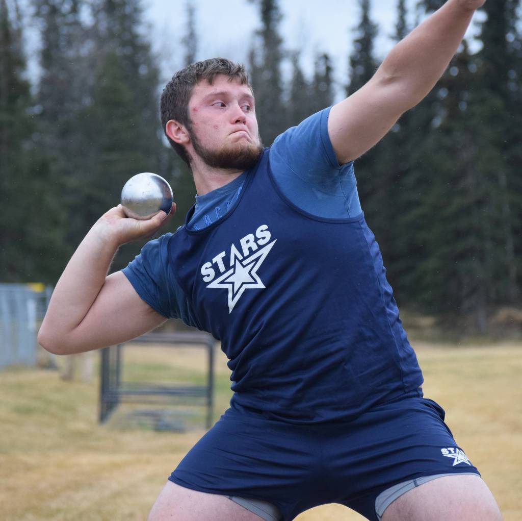Soldotna sophomore Levi Benner launches the discus Saturday afternoon at the Kenai Peninsula Borough track and field championships at Justin Maile Field in Soldotna. (Photo by Joey Klecka/Peninsula Clarion)