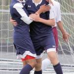 Soldotna&rsquo;s Alex Montague and Brayden VanMeter celebrate a goal during the Northern Lights Conference Championships quarterfinals Thursday, May 18, 2017, at Colony High. (Photo by Jeremiah Bartz/Frontiersman.com)