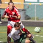 Colony&rsquo;s Michael Shower slides to knock the ball away from Kenai&rsquo;s Zack Tuttle during Kenai&rsquo;s 3-1 win over the Knights in the Northern Lights Conference boys title game Saturday, May 20, 2017, at Colony High. Tuttle scored twice in the win. (Photo by Jeremiah Bartz/Frontiersman.com)