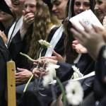 Soon-to-be graduates of Nikiski Middle-High School laugh and cheer during their ceremony Tuesday, May 23, 2017 at the school&rsquo;s gymnasium in Nikiski, Alaska. (Megan Pacer/Peninsula Clarion)