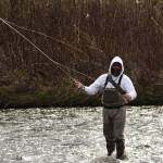 An angler makes a cast into the Anchor River on Saturday, May 20, 2017 in Anchor Point, Alaska. (Ben Boettger/Peninsula Clarion)