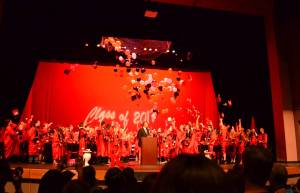 Students in Kenai Central High School&rsquo;s graduating class of 2017 toss their caps in the air at the end of their commencement ceremony Wednesday, May 24, 2017 at the Renee C. Henderson Auditorium in Kenai, Alaska. (Photo courtesy Beth Ulricksen/Peninsula Clarion)