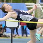 Soldotna&rsquo;s Aliann Schmidt competes in the high jump Friday at the state track and field meet at Machetanz Field in Palmer. (Photo by Jeremiah Bartz/Frontiersman.com)