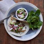 This 2016 photo shows flaky fish tacos in New York. This dish is from a recipe by Katie Workman. (Laura Agra via AP)