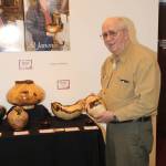 Wood turning artist Al Janonis shows his burl art at KVCC summer show.