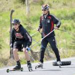 Bradley Walters, a sophomore at Soldotna High School, receives instruction from Andy Liebner on poling technique Monday, June 5, 2017, on South Cohoe Loop. (Photo by Jeff Helminiak/Peninsula Clarion)