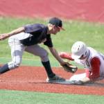 Kenai infielder Porter Fannon tries to tag Wasilla&rsquo;s Ben Werner at second during a 13-3 loss to the Road Warriors on Wednesday, June 14, 2017, at Wasilla High School. (Photo by Jeremiah Bartz/Frontiersman)