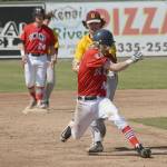 Dimond pitcher Jake Andresen tags out Twins&rsquo; Kenny Griffin to end a rundown in the first game of a doubleheader Saturday, June 17, 2017, at Coral Seymour Memorial Ballpark in Kenai. (Photo by Jeff Helminiak/Peninsula Clarion)