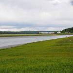 Commercial fishing buoys float in the Kasilof River near the Kasilof River Lodge and Cabins on Monday, June 19, 2017 in Kasilof, Alaska. (Photo by Elizabeth Earl/Peninsula Clarion)