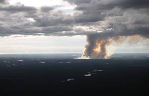 Smoke rises from the burn area of the East Fork Fire on the Kenai National Wildlife Refuge on June 16, 2017 near Sterling, Alaska. &nbsp;(Photo by Elizabeth Earl/Peninsula Clarion)