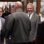 Senators gather in the hallway of the Capitol on Thursday, June 22, 2017, after passing a budget that will keep that the State of Alaska from shutting down on July 1. (Michael Penn | Juneau Empire)