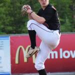 Peninsula Oilers pitcher Tyler Waldrop winds up for a throw against the Anchorage Glacier Pilots, Friday evening at Coral Seymour Memorial Park in Kenai. (Photo by Joey Klecka/Peninsula Clarion)