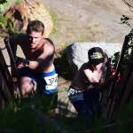 Josiah Martin (left) races Savai&rsquo;i Heaven up the &ldquo;staircase to glory&rdquo; Saturday at the third annual Clam Scramble Mud Run in Ninilchik. (Photo by Joey Klecka/Peninsula Clarion)