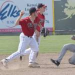 Oilers shortstop John Thomas forces out Carter Bins of the Glacier Pilots at second base Sunday, June 25, 2017, at Coral Seymour Memorial Park in Kenai. (Photo by Jeff Helminiak/Peninsula Clarion)