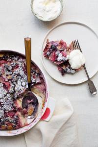 This June 1 photo shows a berry clafoutis in New York. This dish is from a recipe by Katie Workman. (Sarah E Crowder via AP)