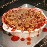 This May 24 photo shows a strawberry-rhubarb crisp at the Institute of Culinary Education in New York. This dish is from a recipe by Elizabeth Karmel. (AP Photo/Richard Drew)