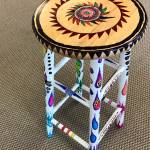 Robert Range of Kenai donated a decorated stool to be auctioned off at the Kenai Fine Art Center’s Annual Harvest Auction, to be held September 30, 2017 in Kenai, Alaska. The stool was created using permanent markers. (Photo by Kat Sorensen/Peninsula Clarion)