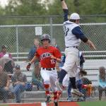 Kenai&rsquo;s Porter Fannon runs to first base as Eagle River first baseman Logan Smith leaps unsuccessfully for the throw during the second game of an Alaska American Legion Baseball doubleheader between Kenai Post 20 and Eagle River on Saturday, July 1, 2017 at the Loretta French Sports Complex in Chugiak. Eagle River won 11-6. (Photo by Matt Tunseth/Chugiak-Eagle River Star)