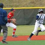 Kenai&rsquo;s Porter Fannon chases Eagle River&rsquo;s Kamren Williams back to second base during the second game of an Alaska American Legion Baseball doubleheader between Kenai Post 20 and Eagle River on Saturday, July 1, 2017 at the Loretta French Sports Complex in Chugiak. Eagle River won 11-6. (Photo by Matt Tunseth/Chugiak-Eagle River Star)