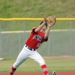 Kenai third baseman Porter Fannon catches a pop fly during the second game of an Alaska American Legion Baseball doubleheader between Kenai Post 20 and Eagle River on Saturday, July 1, 2017 at the Loretta French Sports Complex in Chugiak. Eagle River won 11-6. (Photo by Matt Tunseth/Chugiak-Eagle River Star)