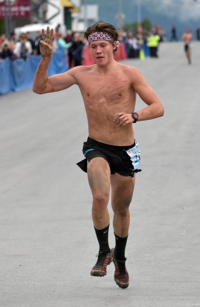 Luke Jager of Anchorage wins his third straight junior boys title Tuesday, July 4, 2017, at Mount Marathon in Seward. (Photo by Jeff Helminiak/Peninsula Clarion)