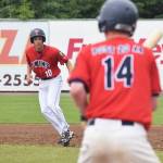 Post 20 Twins baserunner Seth Adkins watches teammate Mose Hayes bat against Napoleon, Ohio, Wednesday at the Bill Miller Wood Bat Tournament at Coral Seymour Memorial Ballpark in Kenai. (Photo by Joey Klecka/Peninsula Clarion)