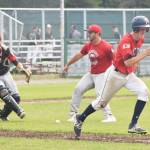 Post 20 Twins catcher Cody Quelland races to beat out a bunt hit against Napoleon, Ohio, Wednesday at the Bill Miller Wood Bat Tournament at Coral Seymour Memorial Ballpark in Kenai. (Photo by Joey Klecka/Peninsula Clarion)