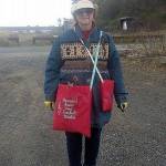 June Searcy-Josten, of Happy Valley, gears up for a day of beachcombing in the cold wind with a large bag for driftwood and smaller bags for miscellaneous shells and rocks. (Photo courtesy/June Searcy-Josten)