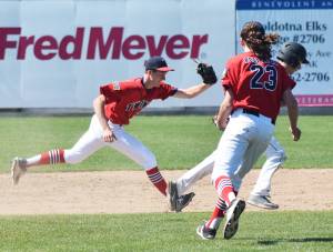 Post 20 Twins shortstop Cody Quelland runs down a West baserunner Thursday at the Bill Miller Wood Bat Tournament at Coral Seymour Memorial Ballpark in Kenai. (Photo by Joey Klecka/Peninsula Clarion)