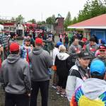 Peninsula Oilers players and Frontier Community Services clients gather for a friendly meet-and-greet barbeque June 29 at the Soldotna Little League fields. (Photo by Joey Klecka/Peninsula Clarion)